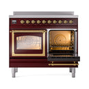 Burgundy induction range with open left oven door and brass trim, front view