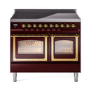 Burgundy induction range with triple glass doors and brass trim, front view