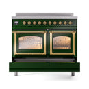 Emerald green range with brass trim, two glass oven windows, and control knobs across top