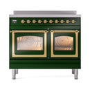 Emerald green range front with brass trim, two glass oven doors, and top control knobs