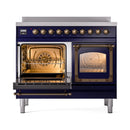 Midnight blue induction range with both oven doors open, racks inside, bronze control knobs