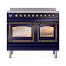Midnight blue induction range with two oven doors, glass windows, and bronze control knobs
