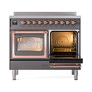 Matte graphite induction range with one oven door open and interior racks visible