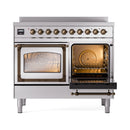 Stainless steel induction range with bronze-trim knobs, left oven door open