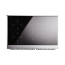 Black cooktop glass panel with subtle heating-zone lines on a white range