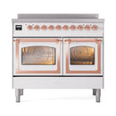White range front with copper-trim doors, two oven windows, and burner control knobs
