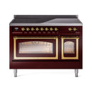 Burgundy induction range with dual glass oven doors and brass trim, front view