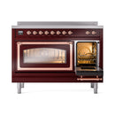 Burgundy induction range with one oven door open and copper trim, racks visible