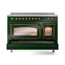 Emerald green induction range with bronze-trim knobs and closed triple-glass oven doors