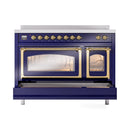 Midnight blue induction range showing both ovens with illuminated interior racks