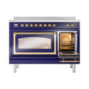 Midnight blue induction range with side oven door open and brass handle detail