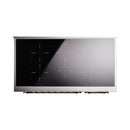 White induction range front with bronze-trimmed door frame and dark glass viewing panel