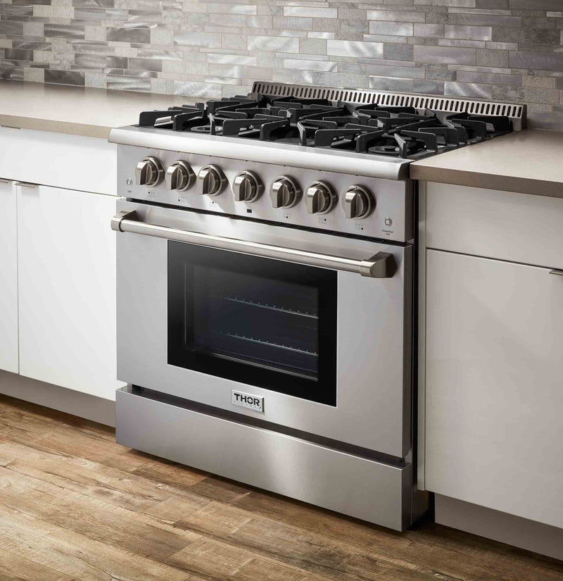 Thor Kitchen 4-Piece Pro Appliance Package - 36" Gas Range, French Door Refrigerator, Wall Mount Hood and Dishwasher in Stainless Steel Appliance Package Thor Kitchen 